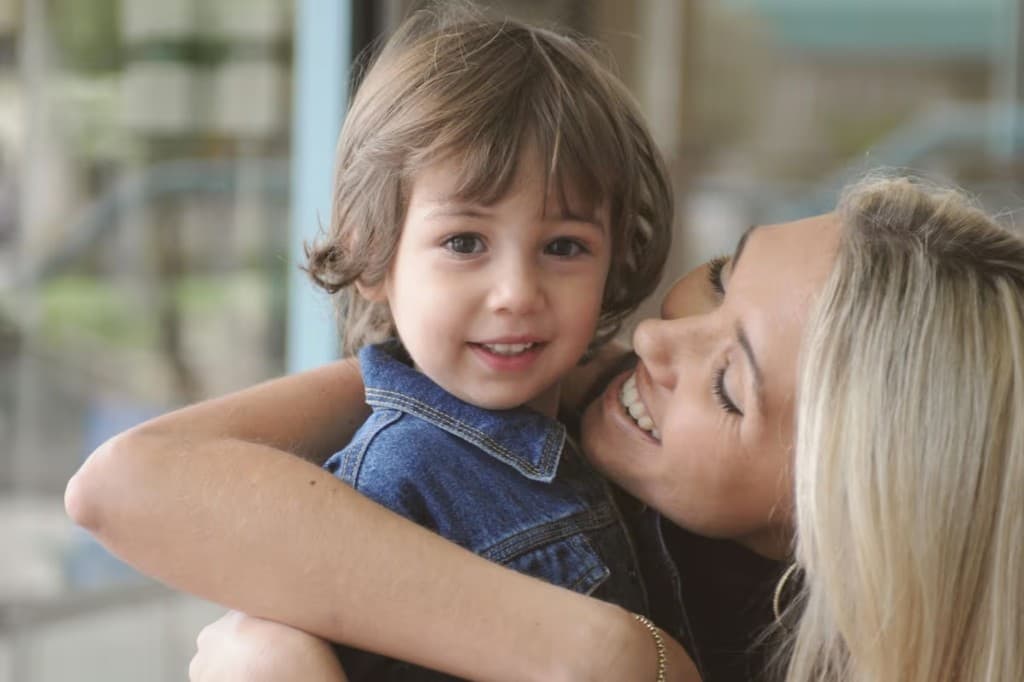 Parent hugging child